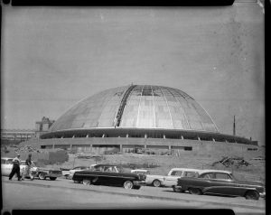 Civic Arena construction nearing completion with parked cars and Connelley Trade School on left, Lower Hill District, Pittsburgh, Pennsylvania, c. 1960 - 1961. (Photo by Charles 'Teenie' Harris/Carnegie Museum of Art/Getty Images)